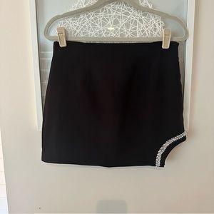 INDEFEIR black mini skirt with rhinestone cutout